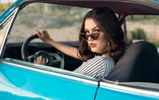 woman sitting in vehicle